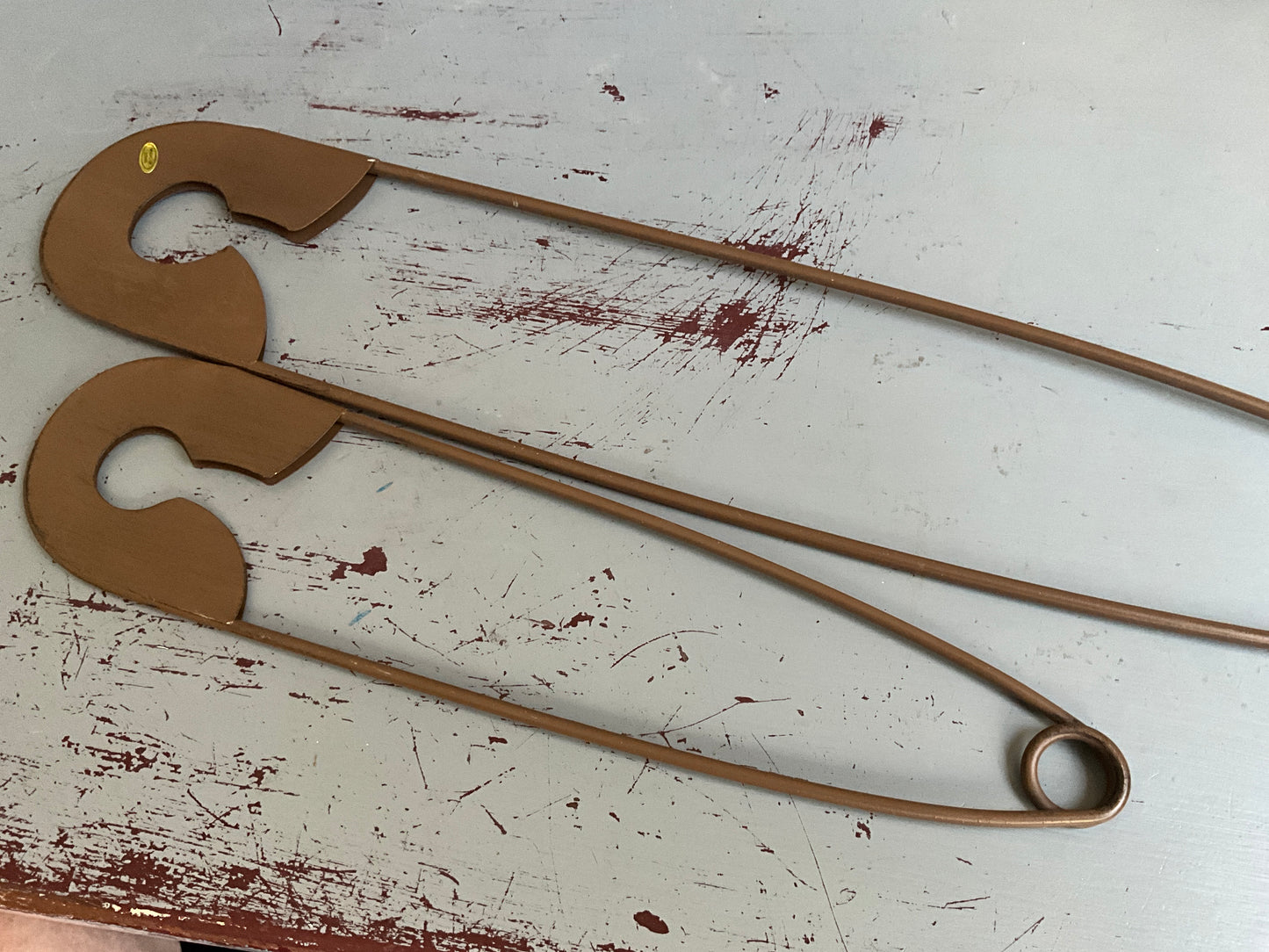 Sensational safety-pins pair of giant antique brown wall hangings that actually open and close