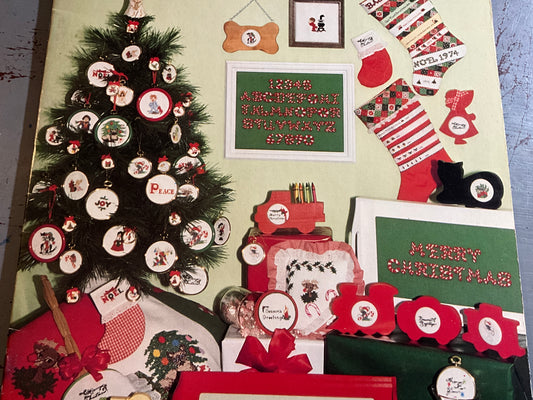 Designs by Janice Maltox Baldwin Christmas Kids N Critters counted cross stitch chart