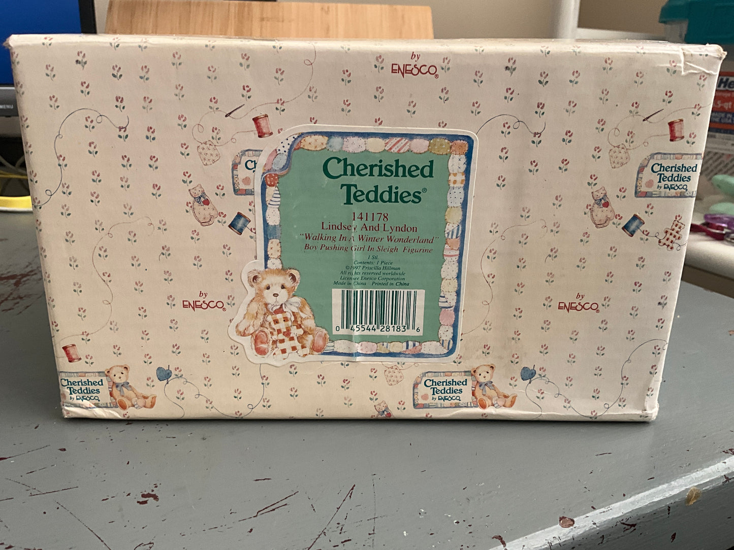 Cherished Teddies Lindsey and Lyndon walking in a winter wonderland boy pushing a girl in a sleigh figurine