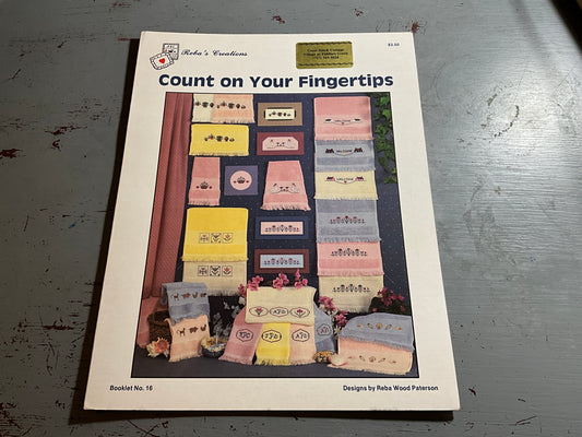 Reba’s Creations Count On Your Fingertips Booklet No. 16 & Charles Craft white hand towel counted cross stitch chart and stitch-able set