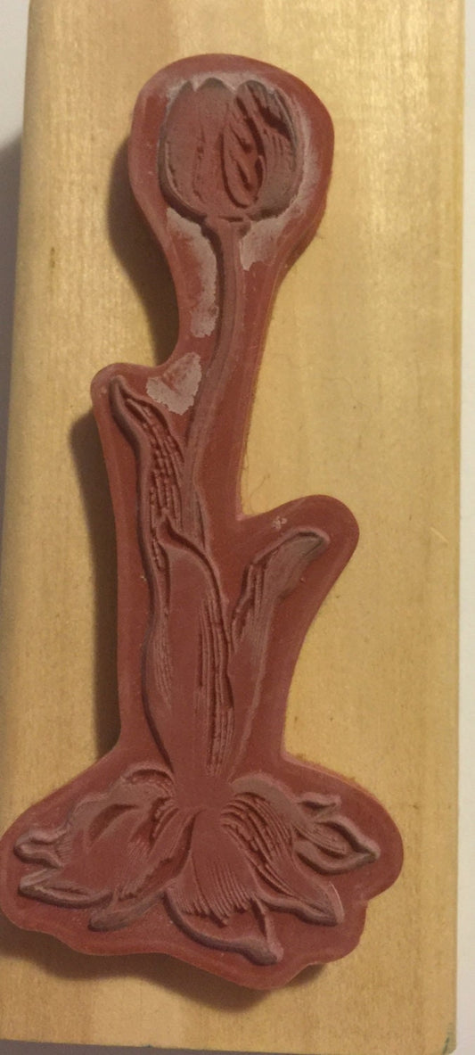 Flower stamp by Anita's stamps mounted on wood