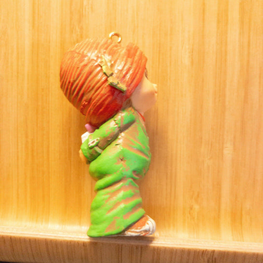 Little Boy in Knit Cap, Hiding Gift Behind His Back, Ornament