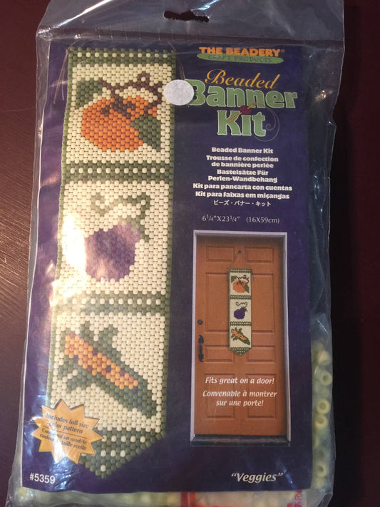The Beadery Craft Products Beaded Banner Kit "Veggies" #5359 makes a 6 1/4" wide by 23 1/4 long banner Fits great on a door
