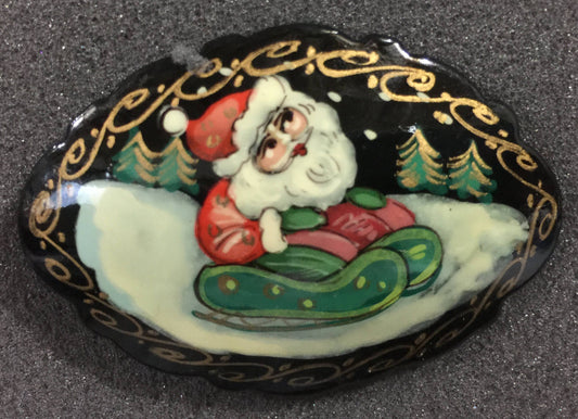 Santa riding a sled, wooden pin, vintage, handmade and painted In Russia by Matryoshka doll artist