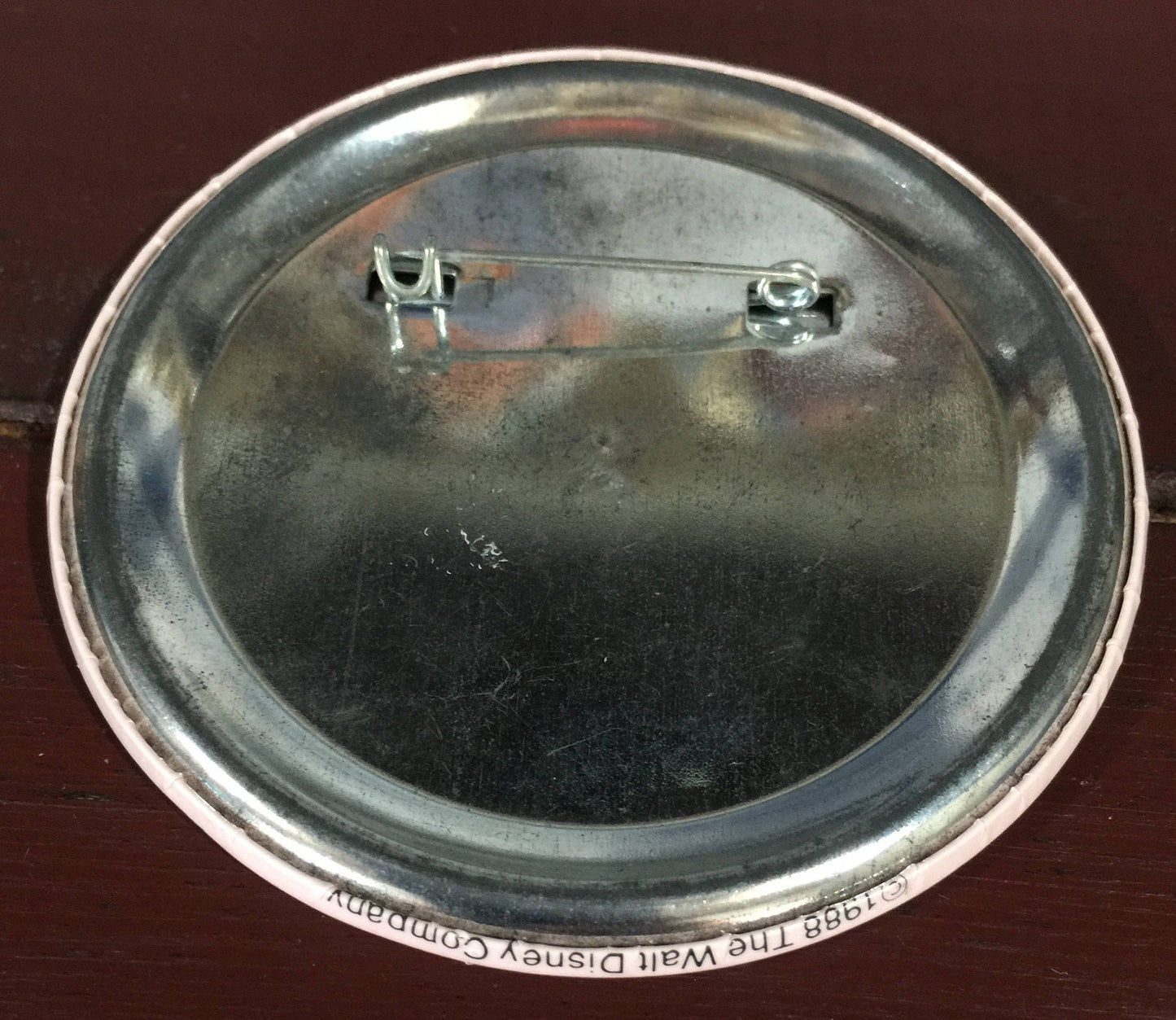 Disneyland pin depicting Mickey Mouse in tux and sneakers, commemorating sixty years 1928-1988, vintage collectible