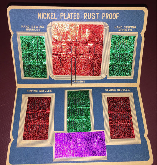 Vintage Sewing Susan Gold and silver needle set without threader and appears to be missing 15 out 60 needles