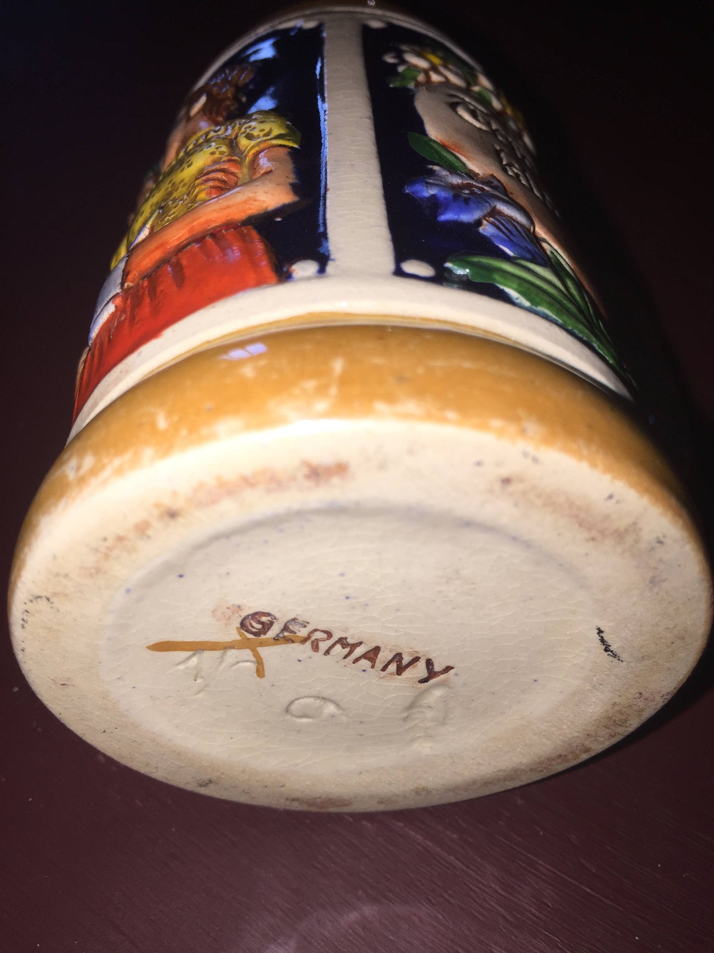 Small Beer Stein depicting couple drinking with the words Trink was klar ist (drink what is clear) Lieb was rar ist (loving what is scarce)