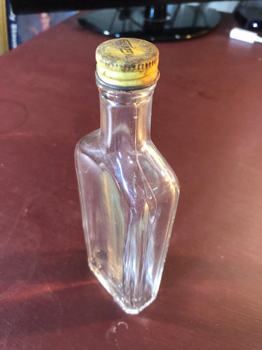 The J.R. Watkins, Vintage Collectible Clear Rectangular, Liniment Bottle with matching metal screw cap imprinted with Watkins