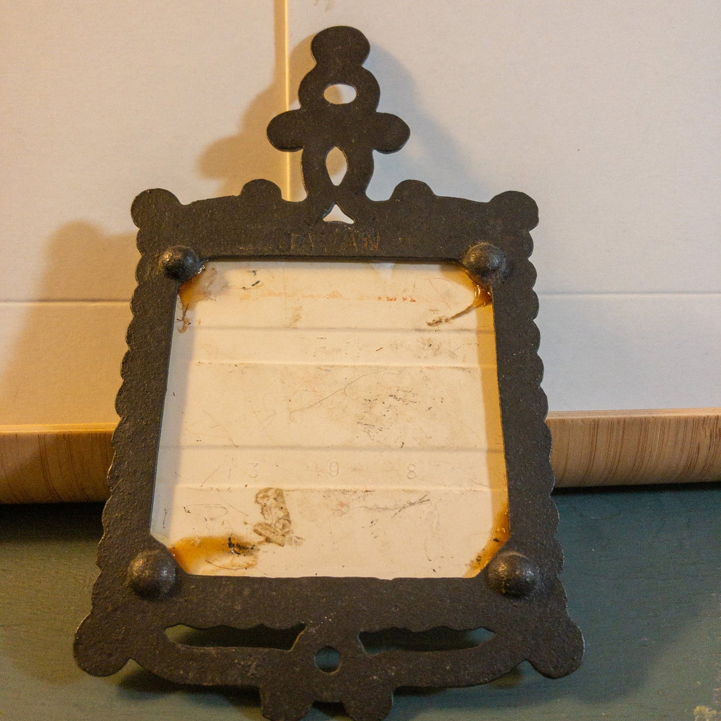 Cast Iron and Tile, 1905 Reo Automobile Trivet,Made in Japan, 3 by 3 inch tile, 6.5 tall by 3.5 wide Inches