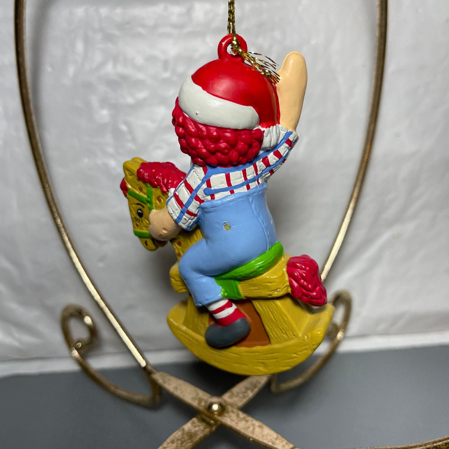 Raggedy Andy In Santa Cap Riding A Rocking Horse Christmas Tree Ornament