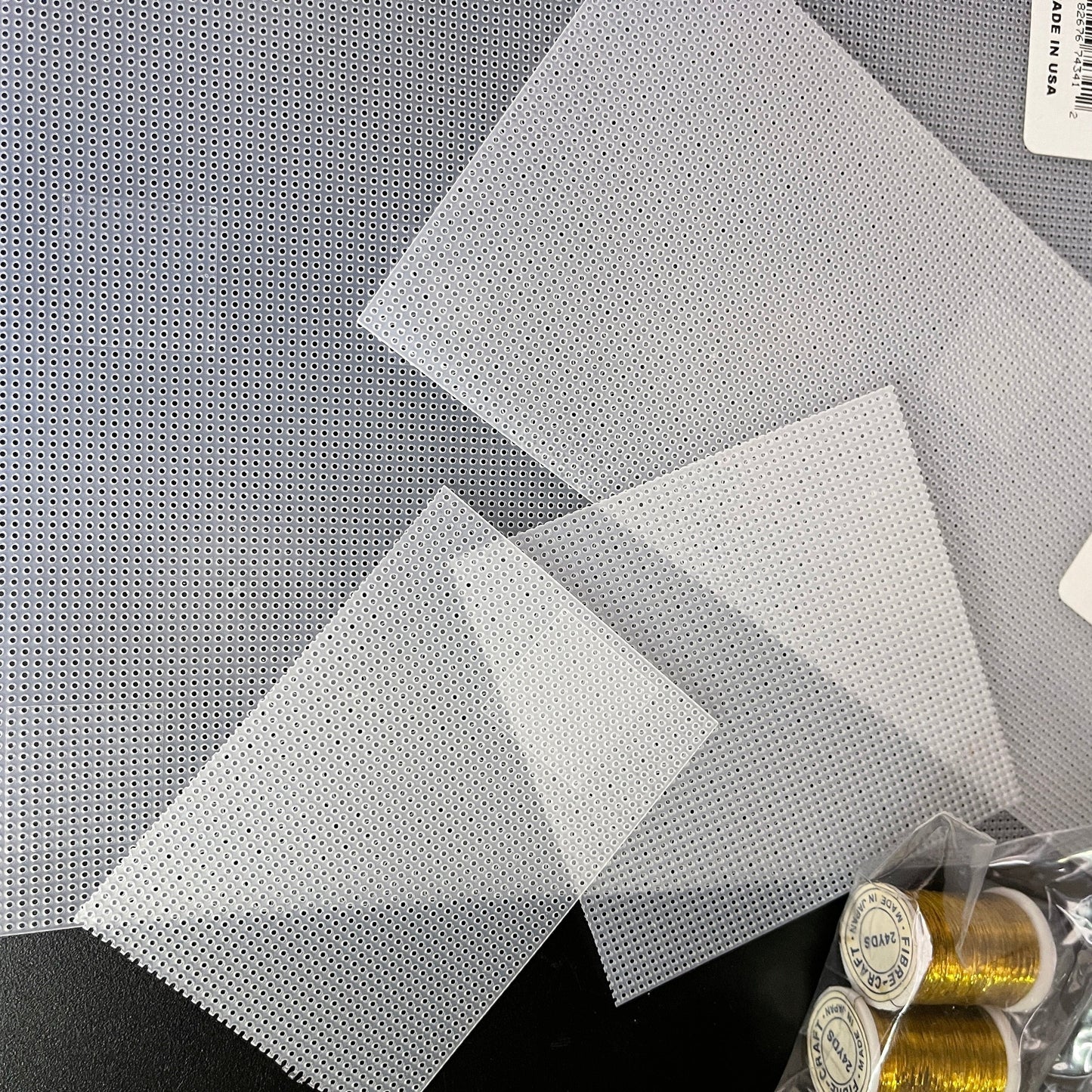 Plastic Canvas 14 count mesh 8 by 11 inches plus small pieces and 2 spools of gold thread