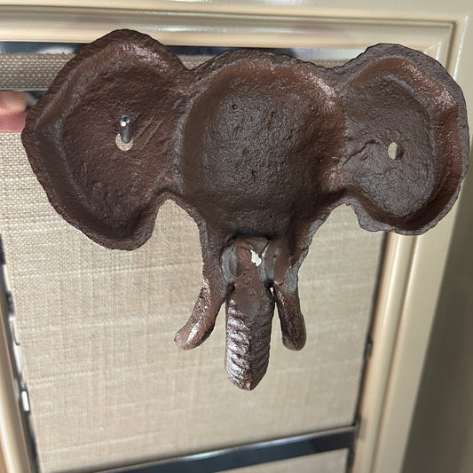 Tremendous trunk and tusks elephant cast iron wall hook