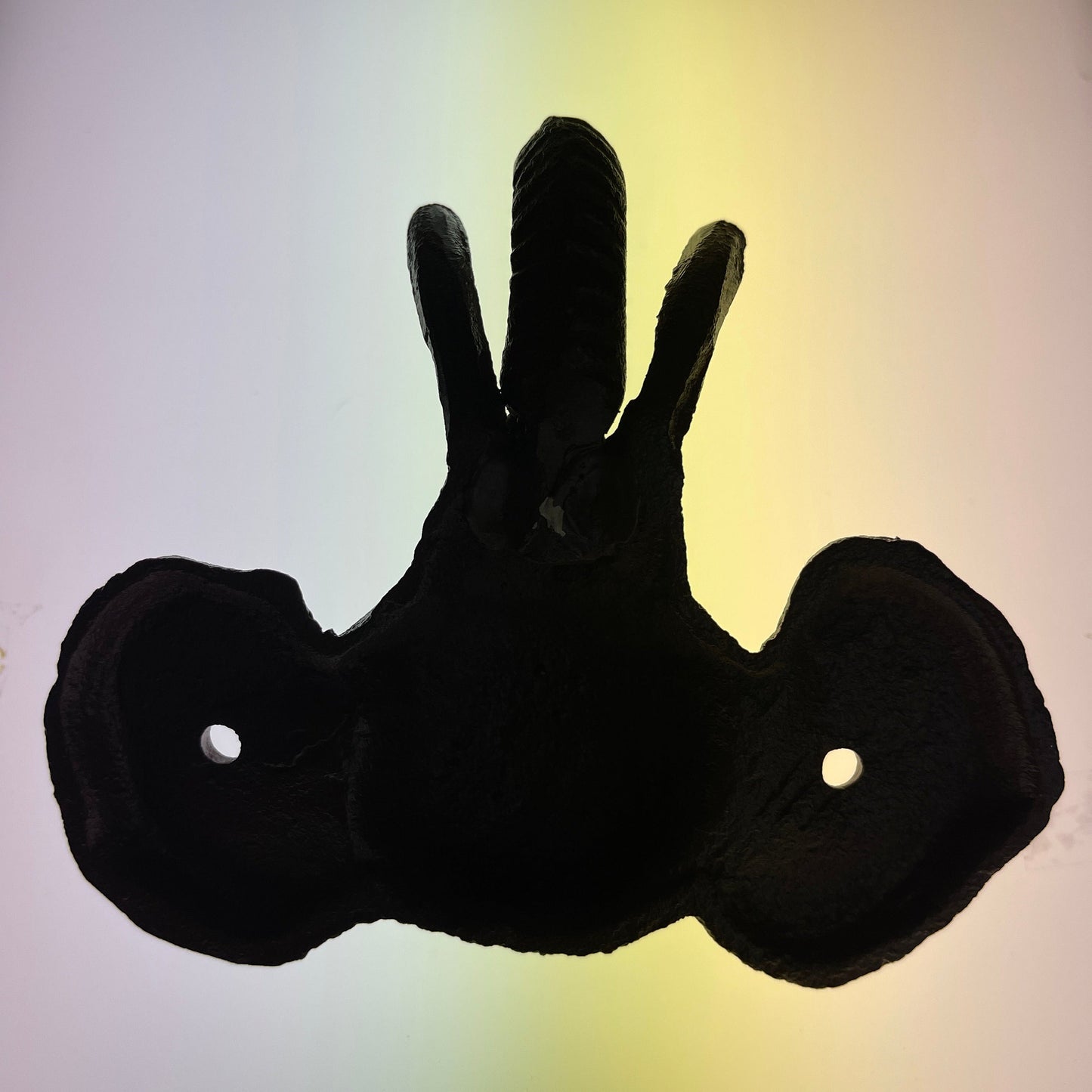 Tremendous trunk and tusks elephant cast iron wall hook