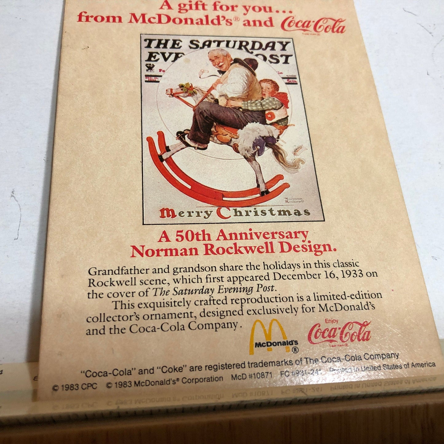 Norman Rockwell, Grandfather and grandson On A Rocking Horse*