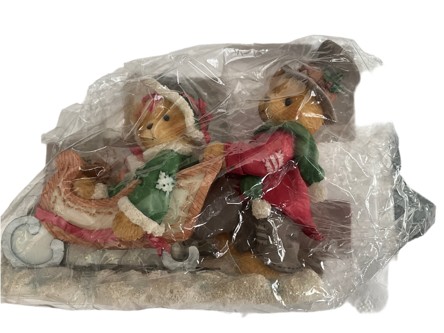Cherished Teddies Lindsey and Lyndon walking in a winter wonderland boy pushing a girl in a sleigh figurine