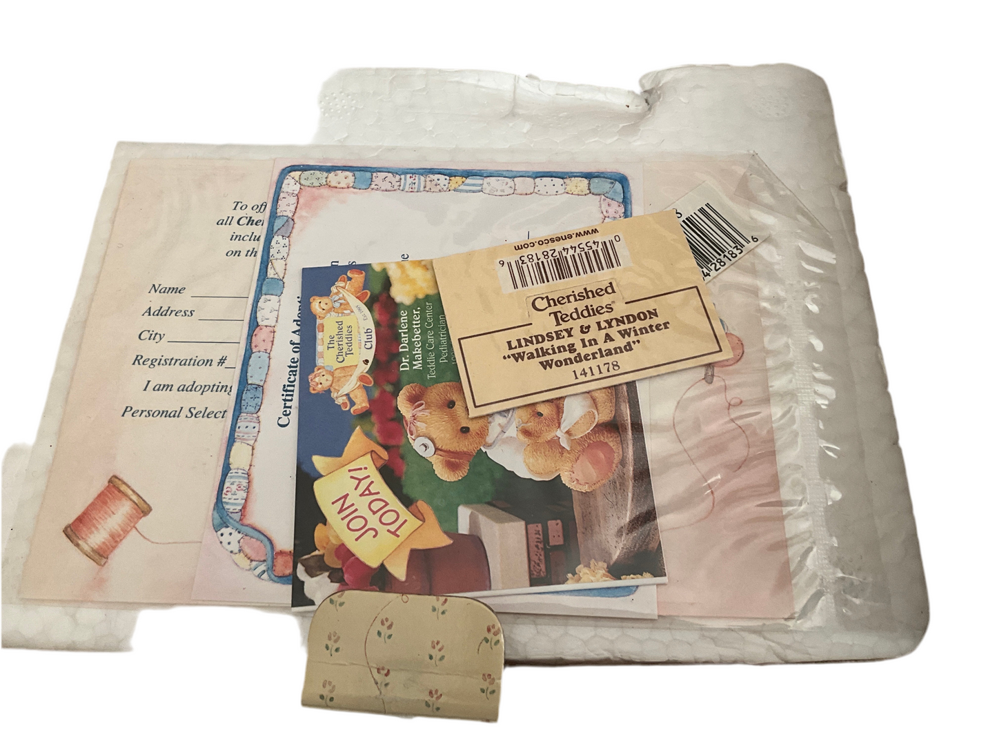 Cherished Teddies Lindsey and Lyndon walking in a winter wonderland boy pushing a girl in a sleigh figurine