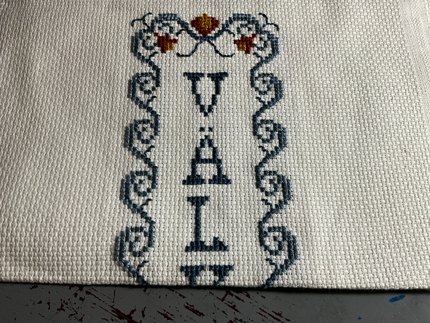 Valkommen Swedish for Welcome completed cross stitch picture