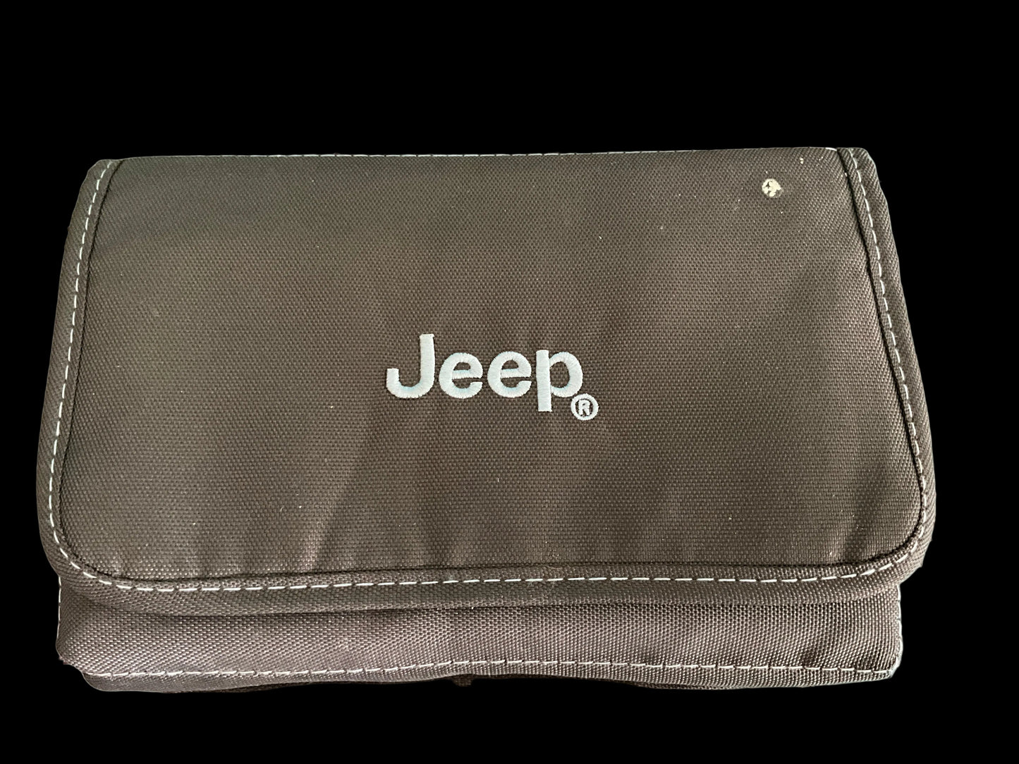 2017 Jeep Renegade user guide,quick reference guide, and associated booklets in a very nice brown canvas pouch vehicle owners manual etc.