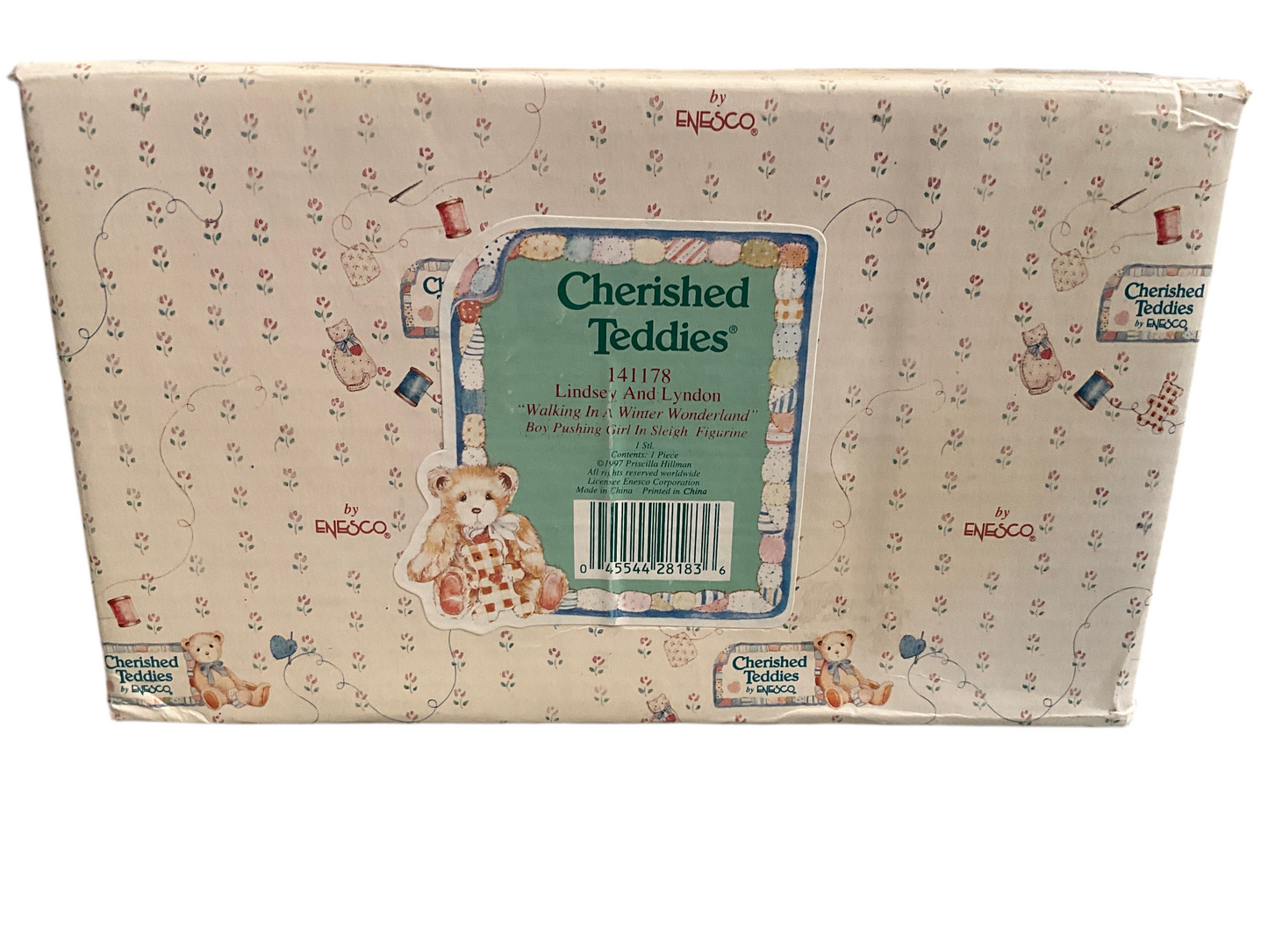 Cherished Teddies Lindsey and Lyndon walking in a winter wonderland boy pushing a girl in a sleigh figurine