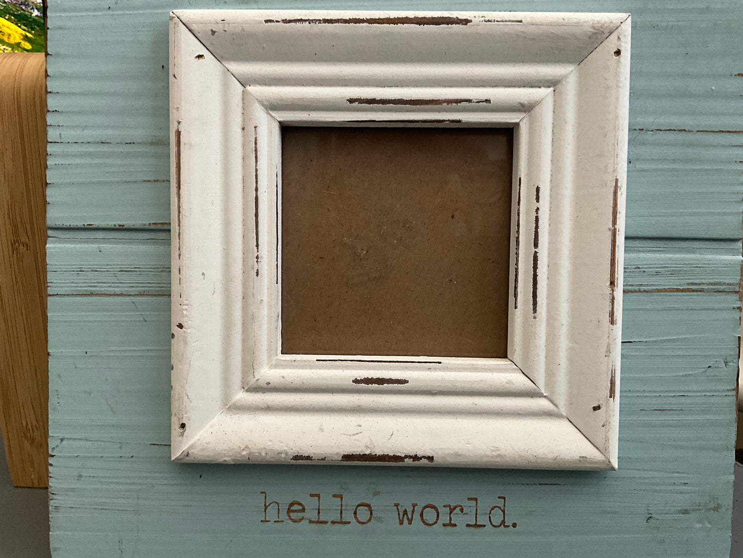 Mudpie “hello world” baby picture wall hanging frame 8” square frame that fits a 3” square picture.