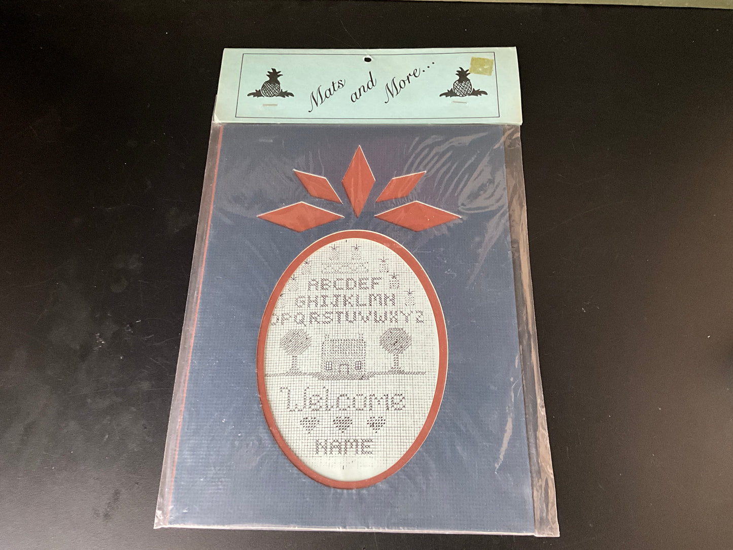 Mats and More… Pineapple shaped mat with cross stitch chart