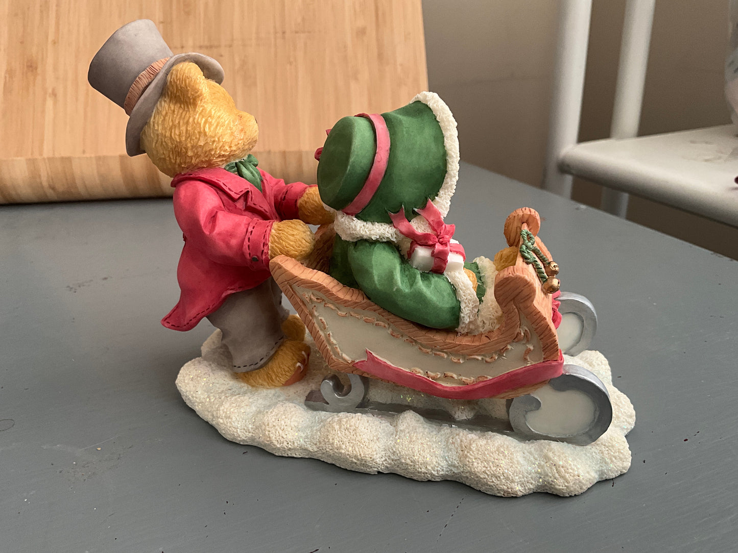 Cherished Teddies Lindsey and Lyndon walking in a winter wonderland boy pushing a girl in a sleigh figurine