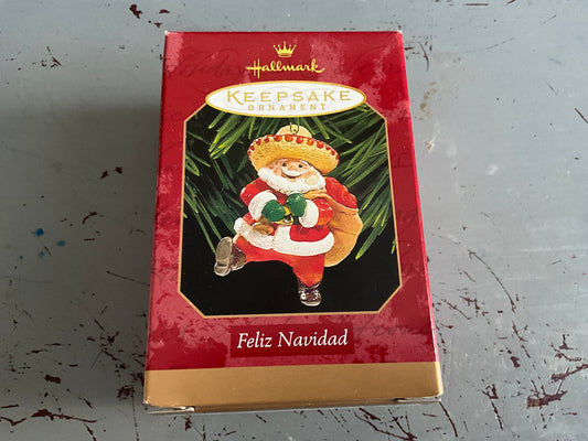 Hallmark Feliz Navidad 1999.  Santa Keepsake ornament. QX6999