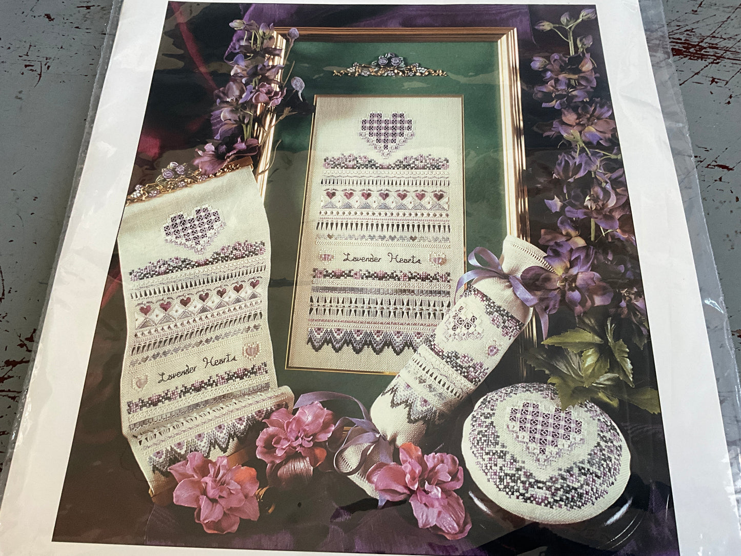 The Victoria Sampler Lavender Hearts Sampler Kit with fabric & embellishments