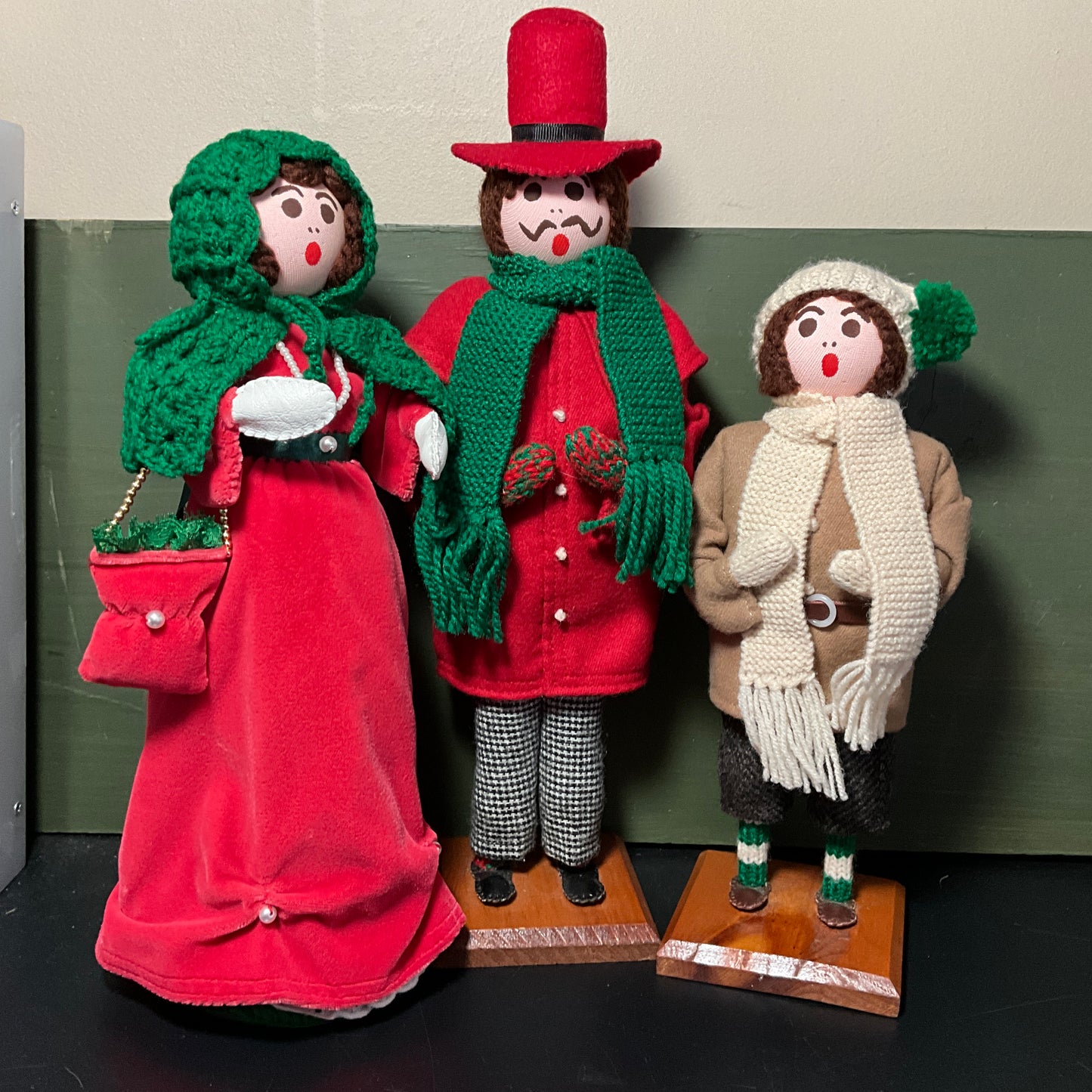 Charming Christmas carolers on wooden pedestals set of 3 handmade vintage collectible figurines