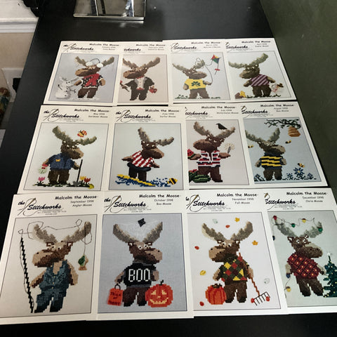 the Stitchworks Malcolm the Moose vintage 1998 set of 12 January through December cross stitch charts