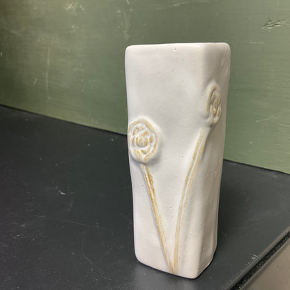 Beautiful bud vase with bas relief roses on porcelain