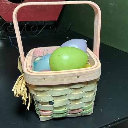 Pretty little Easter egg basket loaded with 6 pastel Easter egg candles