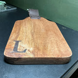 Wooden Cutting Board with large carved in L and leather hanging strap kitchen collectible wall hanging