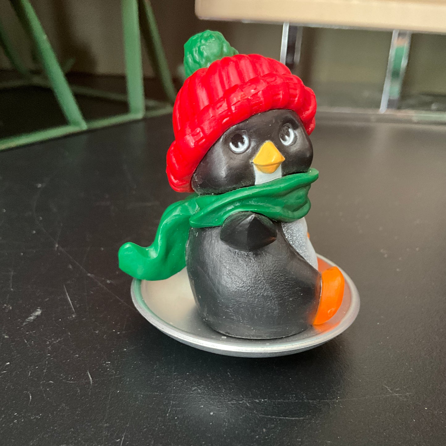 Hallmark 1981 Perky Penguin on saucer sledding Keepsake Ornament