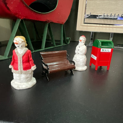 Lemax Santa Claus holding a little toy drum next to his sack of toys collectible figurine