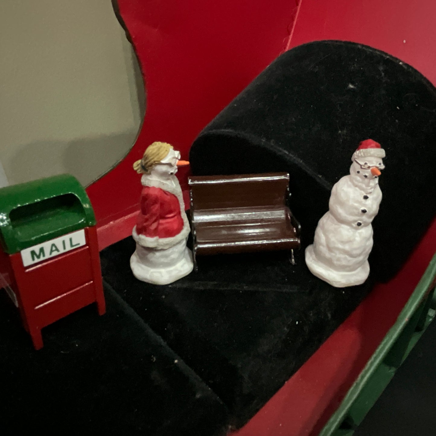 Lemax Santa Claus holding a little toy drum next to his sack of toys collectible figurine