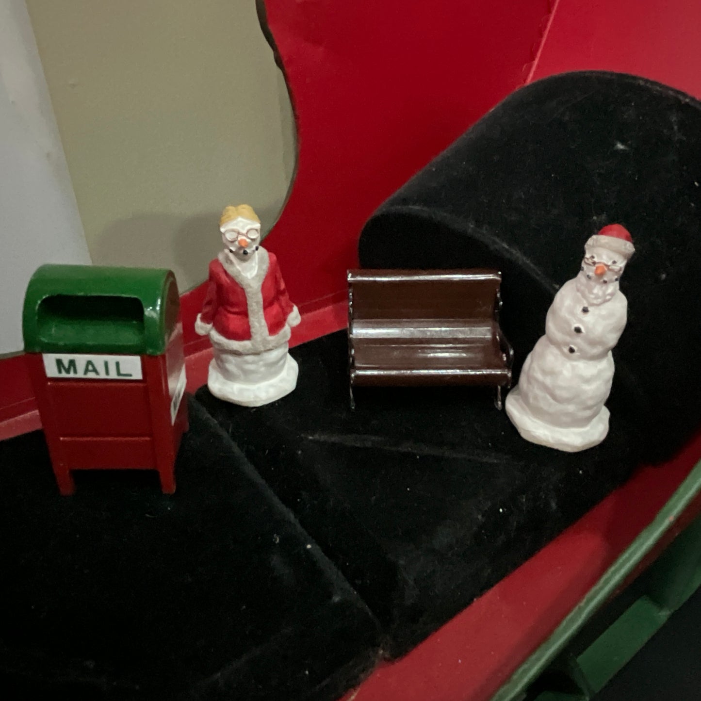 Lemax Santa Claus holding a little toy drum next to his sack of toys collectible figurine