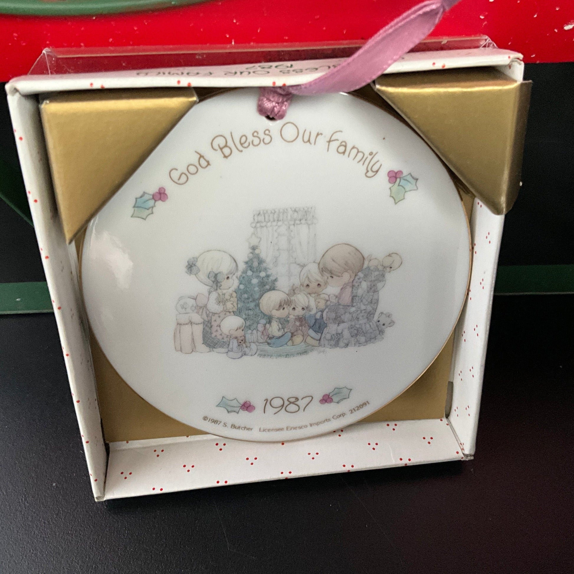 Precious Moments God Bless Our Family dated 1987 porcelain Christmas ornament
