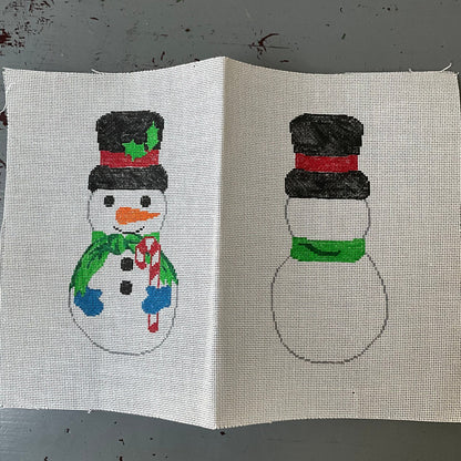 Snowman in top hat and scarf holding a candy cane front & back needlepoint canvas 6 by 3 inches