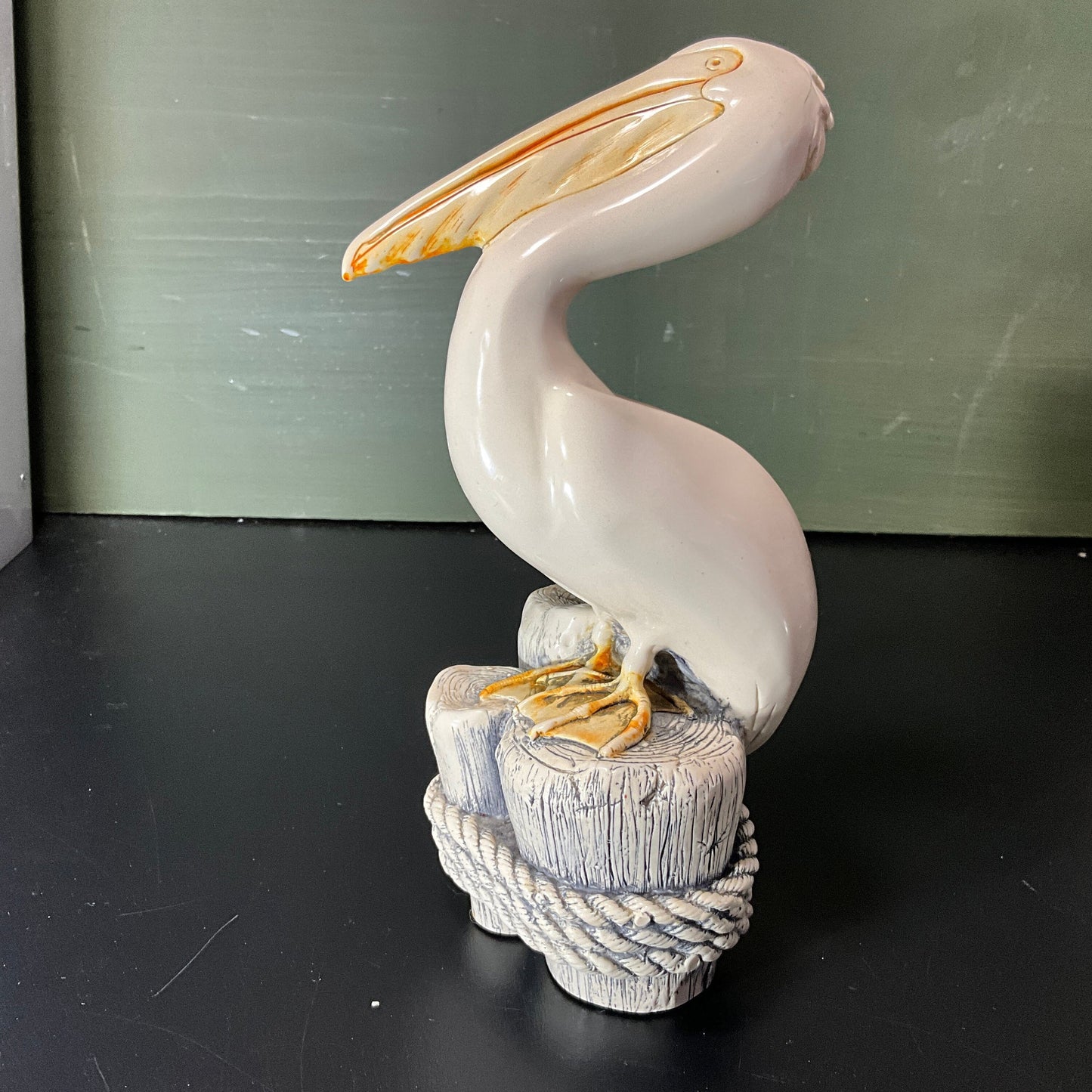 G.H. Cook Company Pelican standing on dock pilings sculpture vintage collectible beach theme figurine