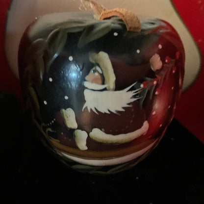 Sensational Santa Claus on dark red apple shape hand painted wooden and raised ornament