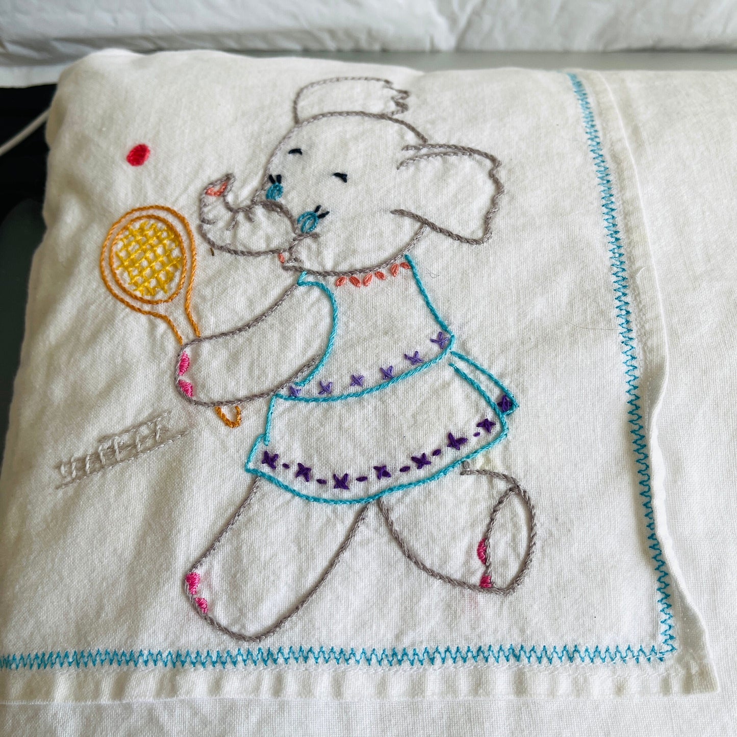 Elephants running and playing tennis, vintage hand embroidered pillowcase