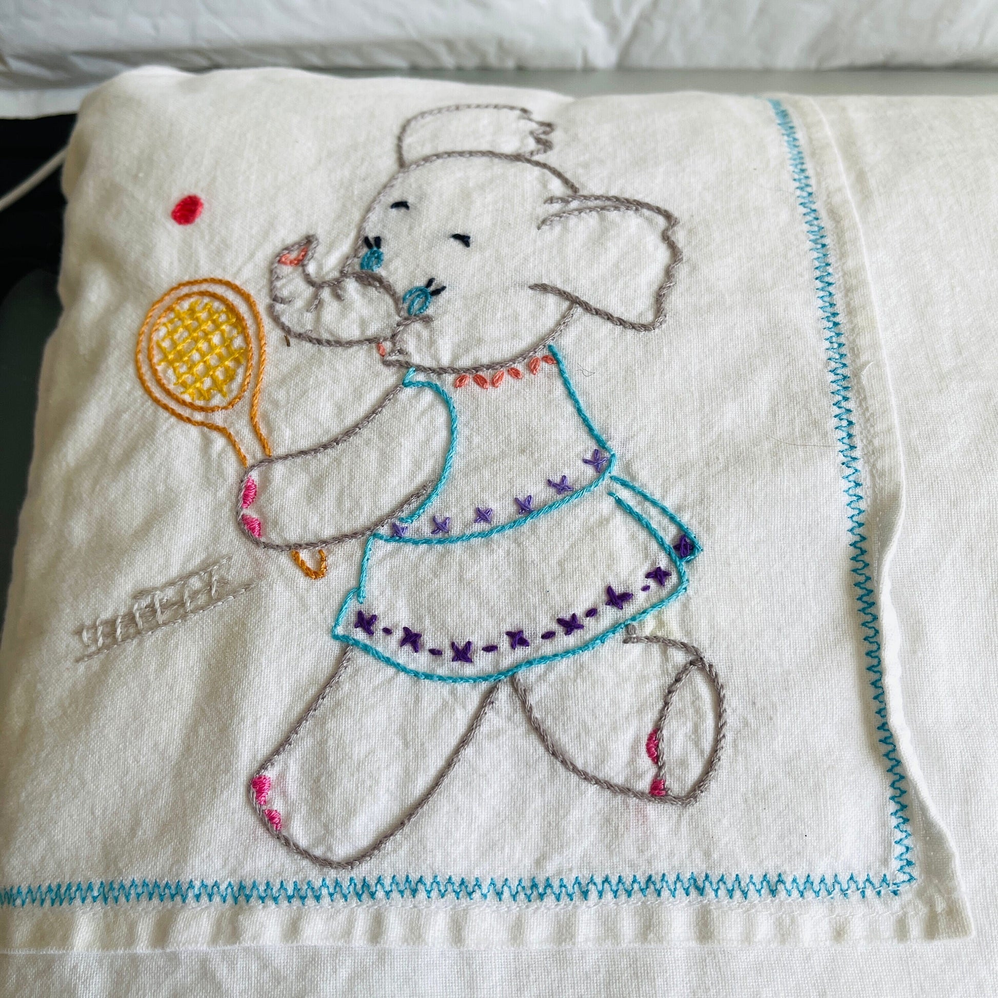 Elephants running and playing tennis, vintage hand embroidered pillowcase