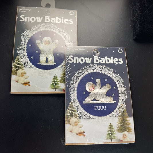 Leisure Arts Snow Babies Set of 2 Slipping and Sliding and It&#39;s Snowing! Counted Cross Stitch Kits