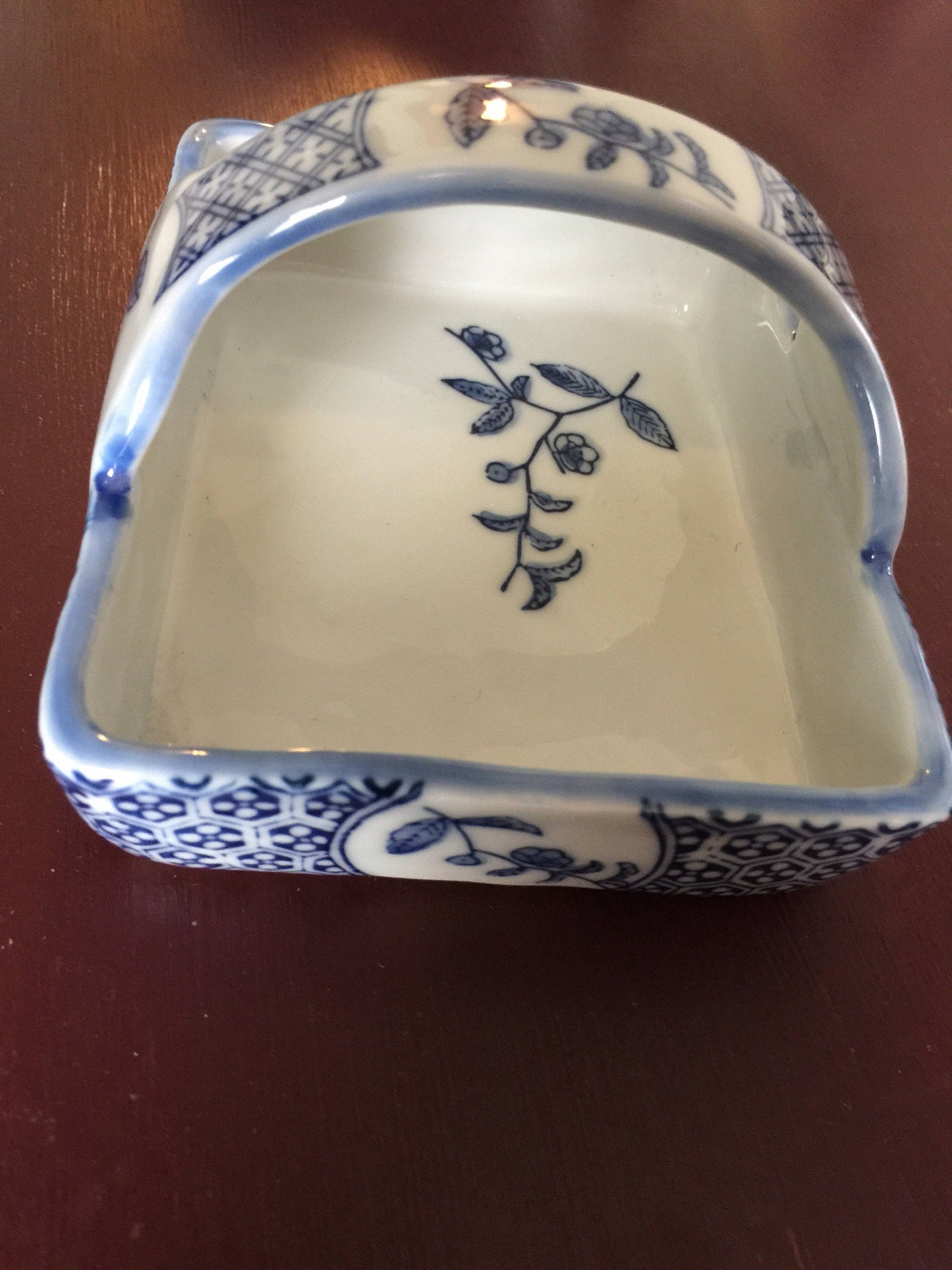 Stone pottery basket with floral pattern in beautiful blue print