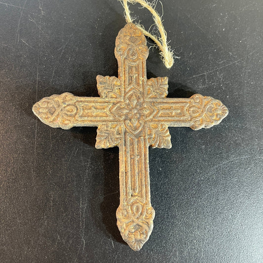 Intricately detailed carved wooden Holy Cross ornament