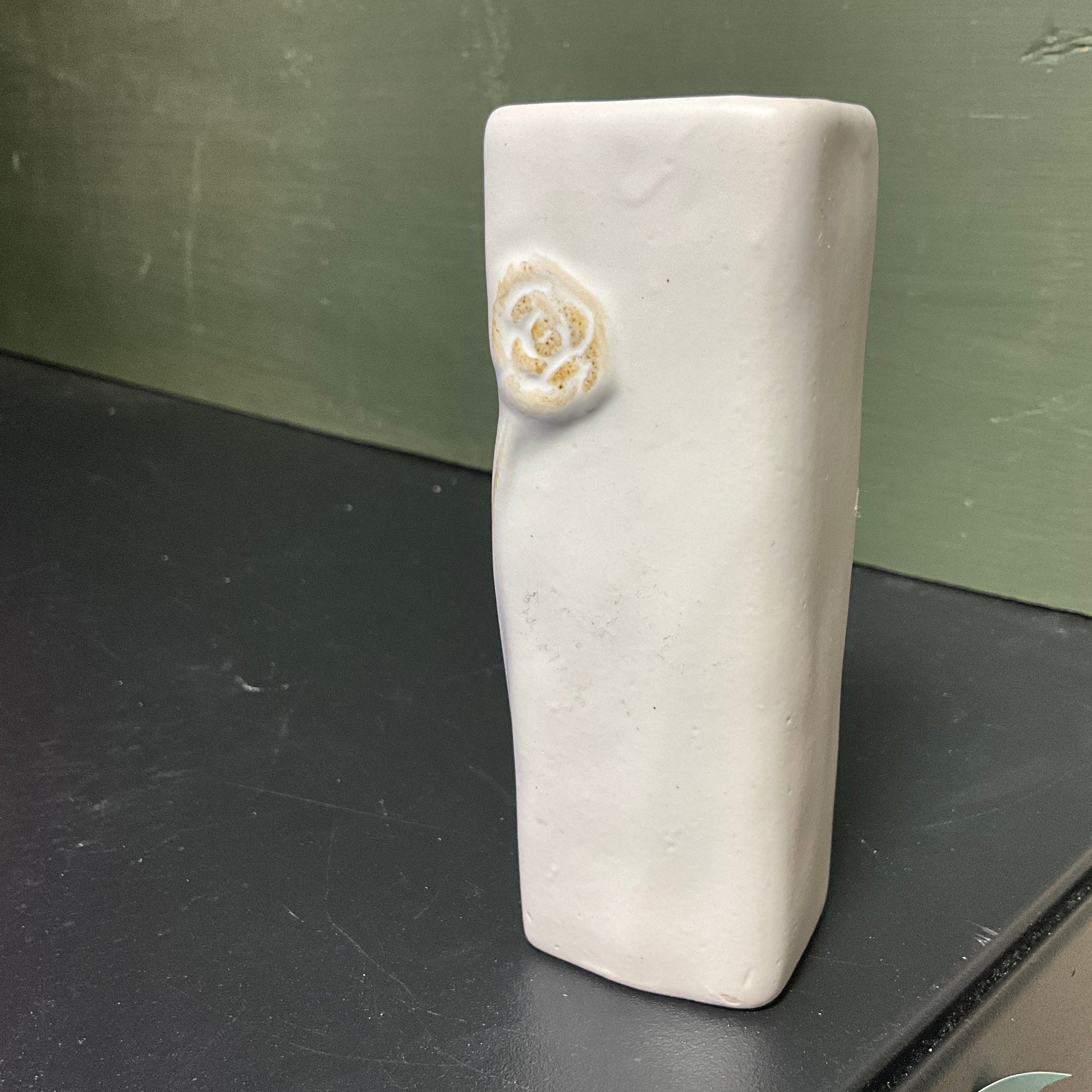 Beautiful bud vase with bas relief roses on porcelain