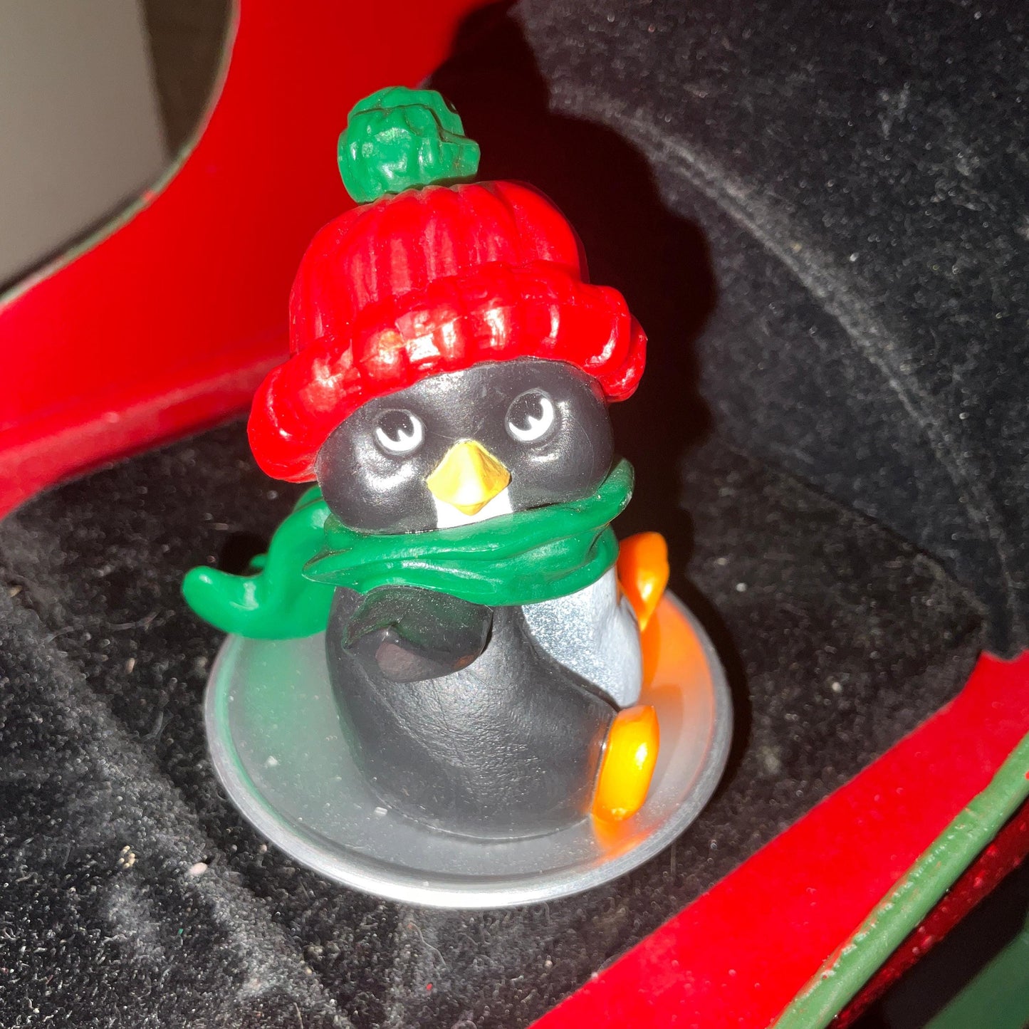 Hallmark 1981 Perky Penguin on saucer sledding Keepsake Ornament