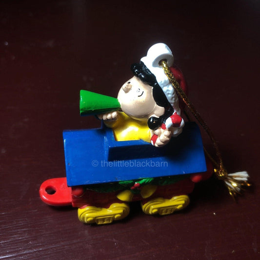 Lusy on a Train Engine with a Megaphone, Charle Schulz Peanuts Character Ornament