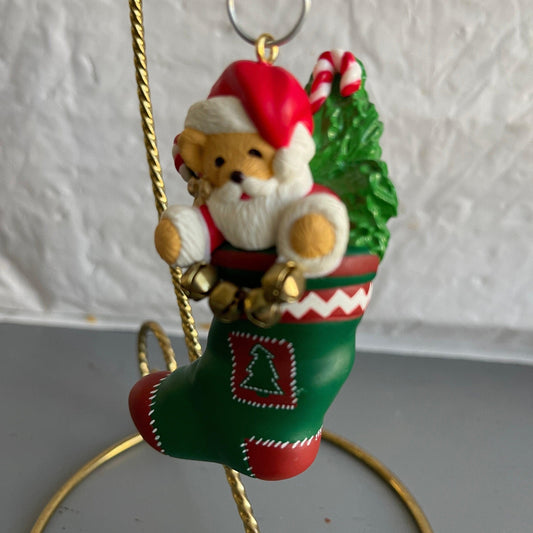 Hallmark Teddy Bear Santa Holding a String Of Metal Bells In A stocking Dated 1996 Christmas Ornament